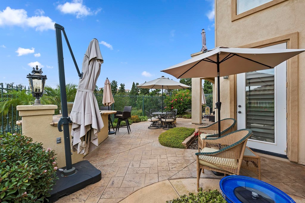 7057 Eider Court Carlsbad, CA 92011 - Photo 59 of 65 a view of outdoor space yard deck and patio