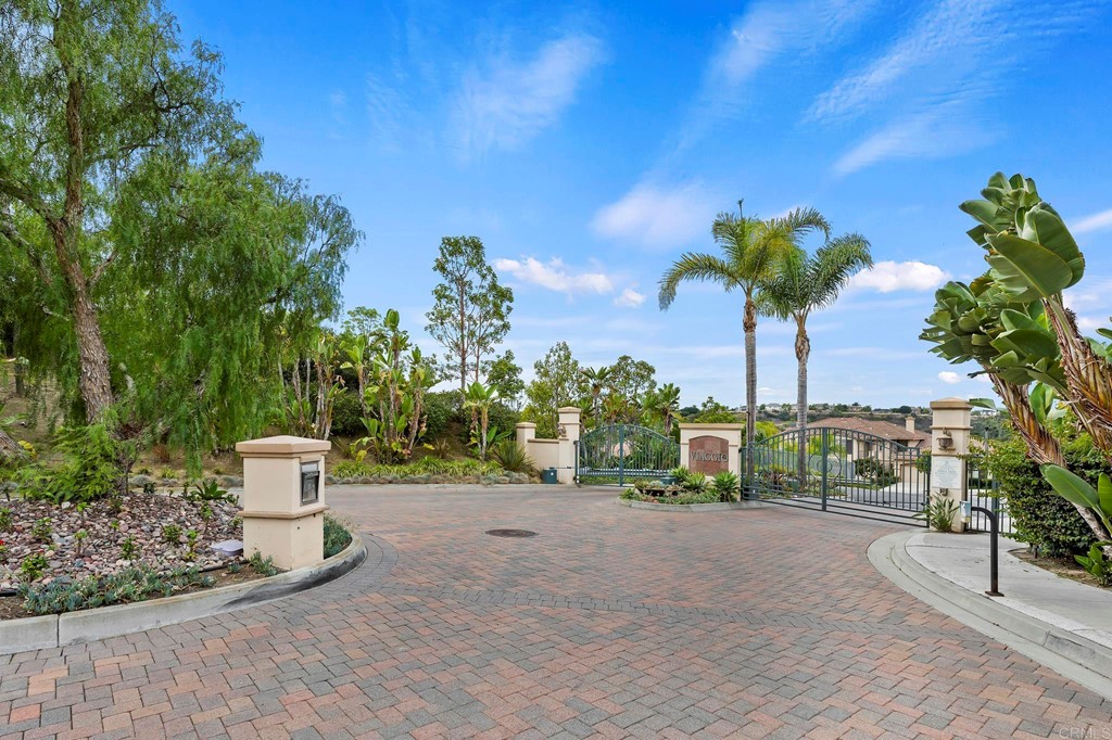7057 Eider Court Carlsbad, CA 92011 - Photo 65 of 65 a view of a garden with a tree