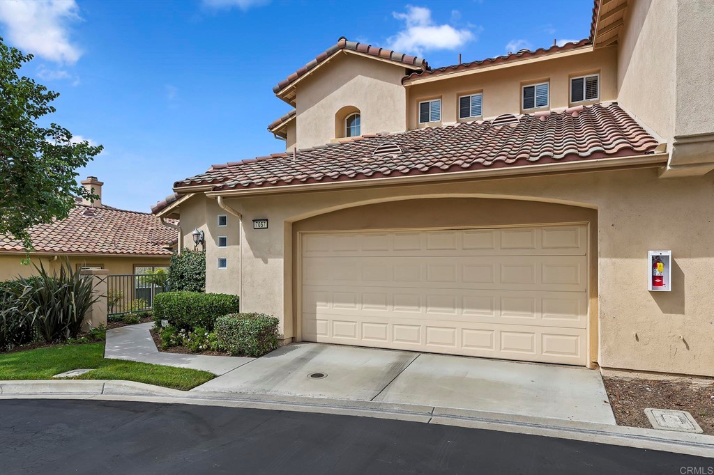 7057 Eider Court Carlsbad, CA 92011 - Photo 7 of 65 a view of house and outdoor space