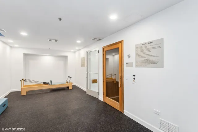 a view of a room with gym equipment