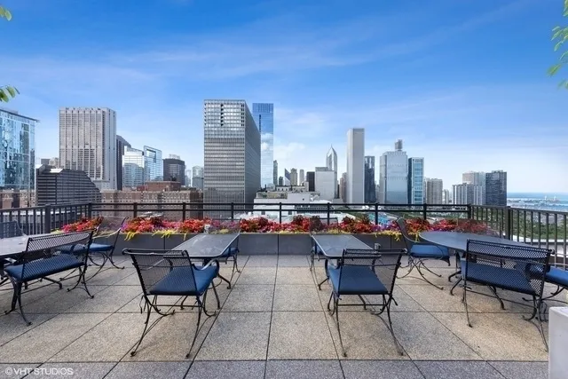 a group of chairs sitting in roof of a city
