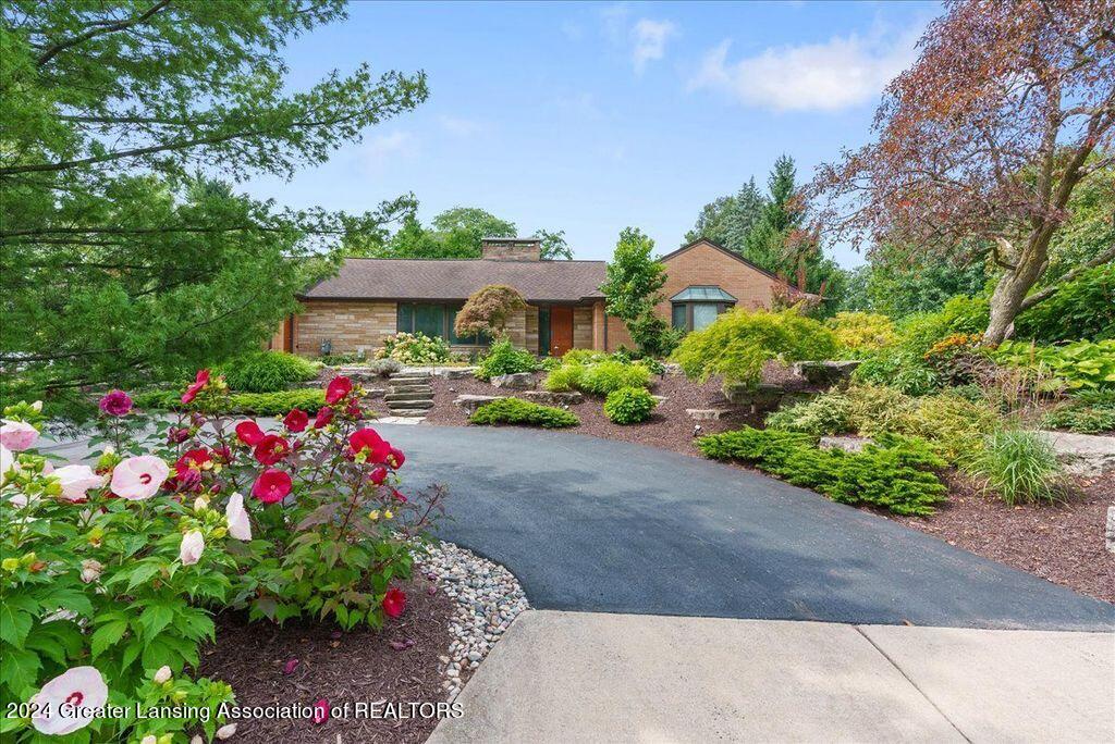 1607 Hitching Post Road East Lansing, MI 48823 - Photo 1 of 61 front