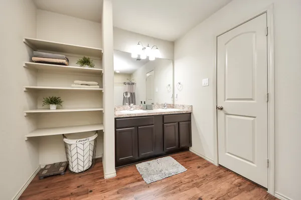 a bathroom with a sink and a mirror