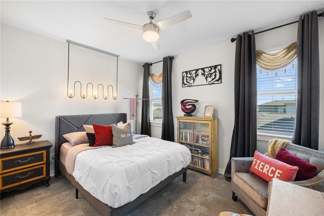 767 Double Mountain Road College Station, TX 77845 - Photo 14 of 34 a bedroom with a bed and a window