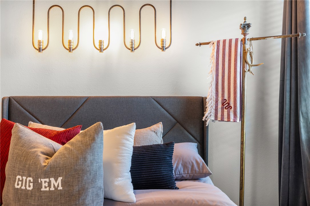 767 Double Mountain Road College Station, TX 77845 - Photo 15 of 34 a view of a couches in a balcony