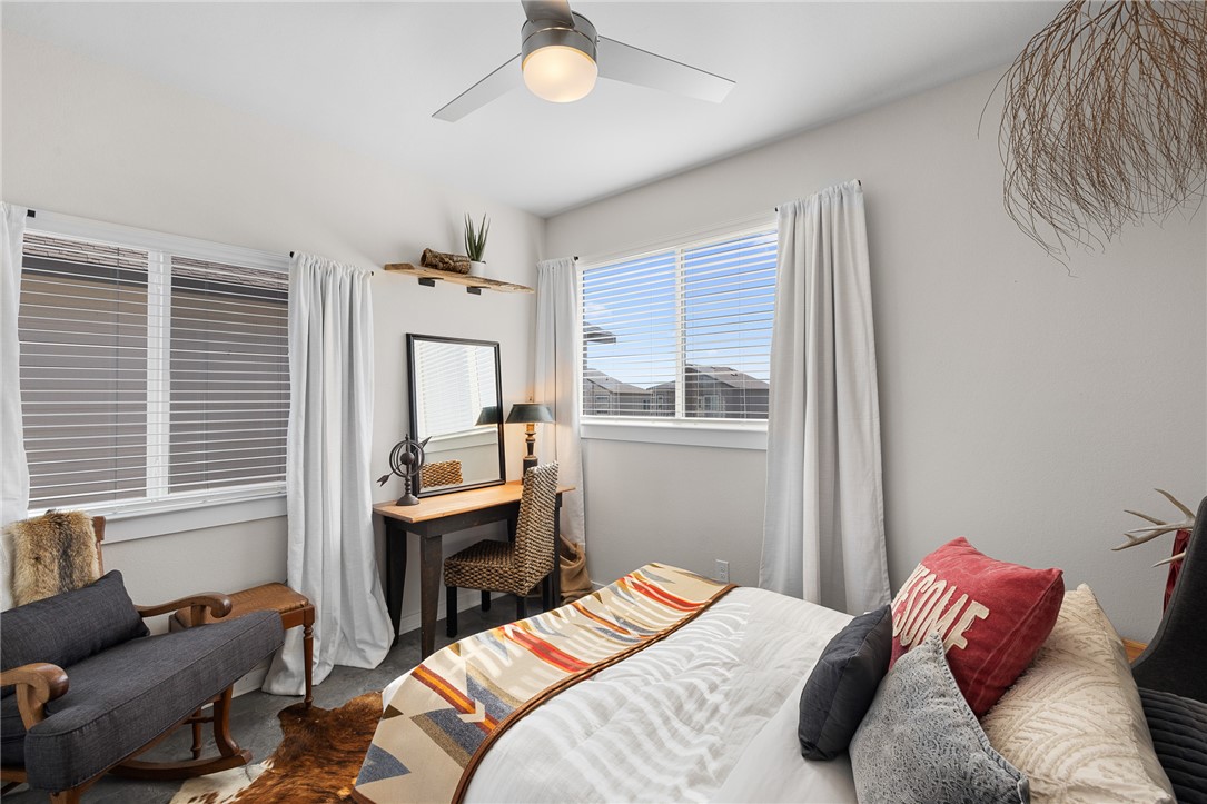 767 Double Mountain Road College Station, TX 77845 - Photo 18 of 34 a bedroom with a bed and a window