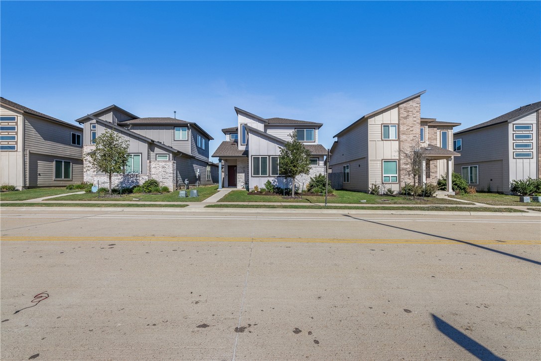 767 Double Mountain Road College Station, TX 77845 - Photo 25 of 34 a front view of a building with a road
