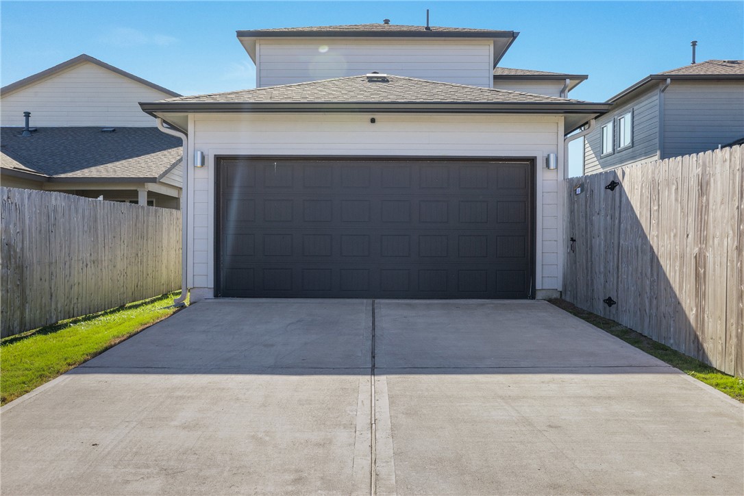 767 Double Mountain Road College Station, TX 77845 - Photo 26 of 34 a view of a car garage of the house