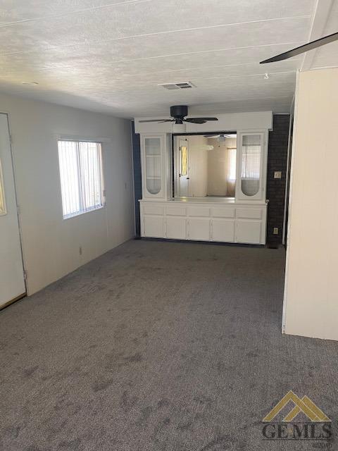Undisclosed Address Bakersfield, CA 93307 - Photo 10 of 11 a view of an empty room and window