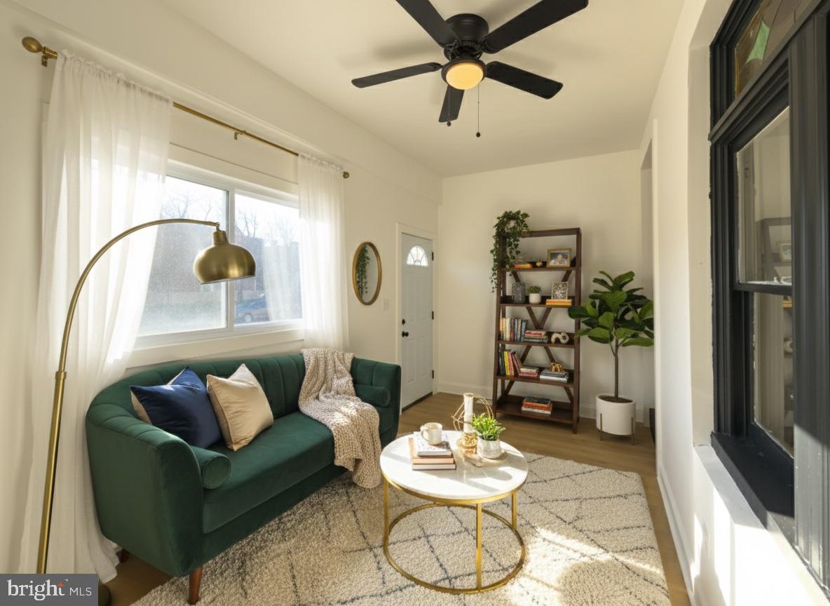 5237 Greenway Avenue Philadelphia, PA 19143 - Photo 3 of 28 Virtually Staged Enclosed Front Porch