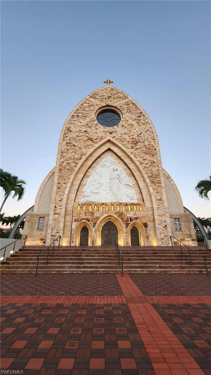 5220 Milano Street Ave Maria, FL 34142 - Photo 21 of 27 a front view of a house