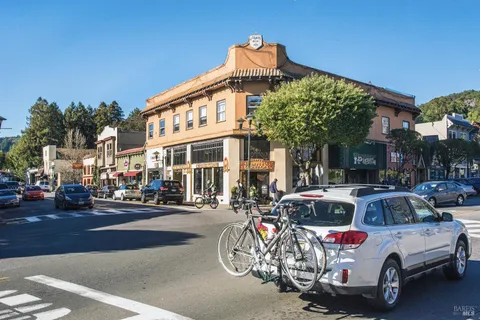 a view of a street with cars