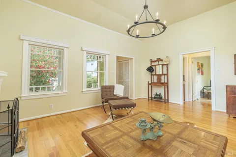 a living room with furniture rug and window