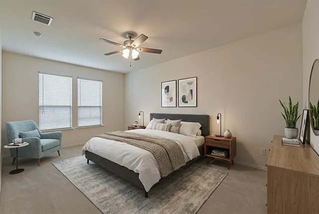 a bedroom with a bed and window