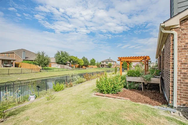 a view of a lake with a houses