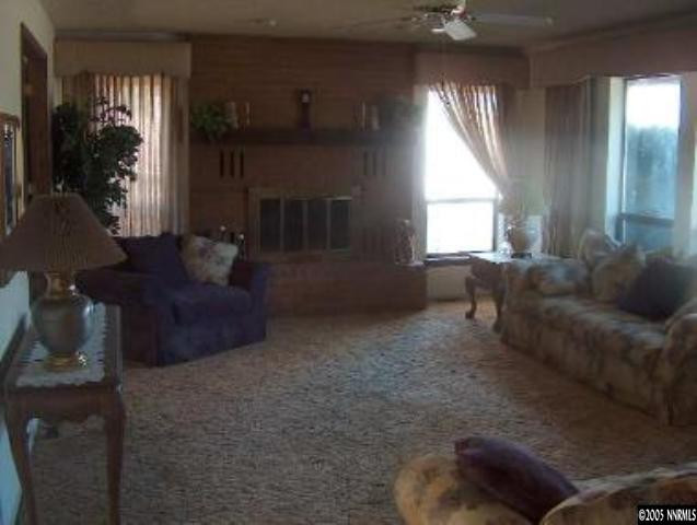 2771 East Lakeridge Reno, NV 89509 - Photo 4 of 8 a living room with furniture and a large window