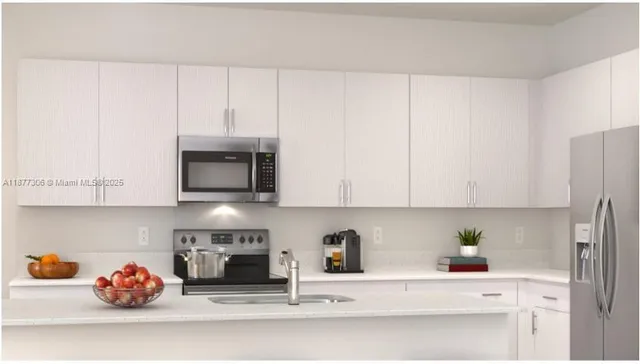 a kitchen with a cabinets and a fireplace