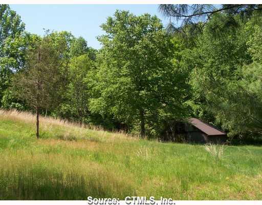 4 River Road East Haddam, CT 06423 - Photo 1 of 1 Land/Lot. Northern slope with back of garage.