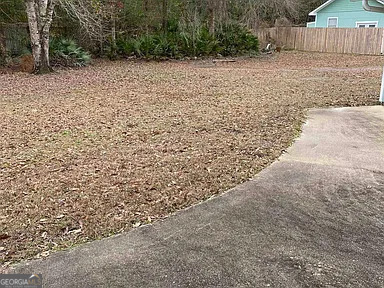 176 Whippoorwill Circle Kingsland, GA 31548 - Photo 18 of 18 a view of a wooden fence