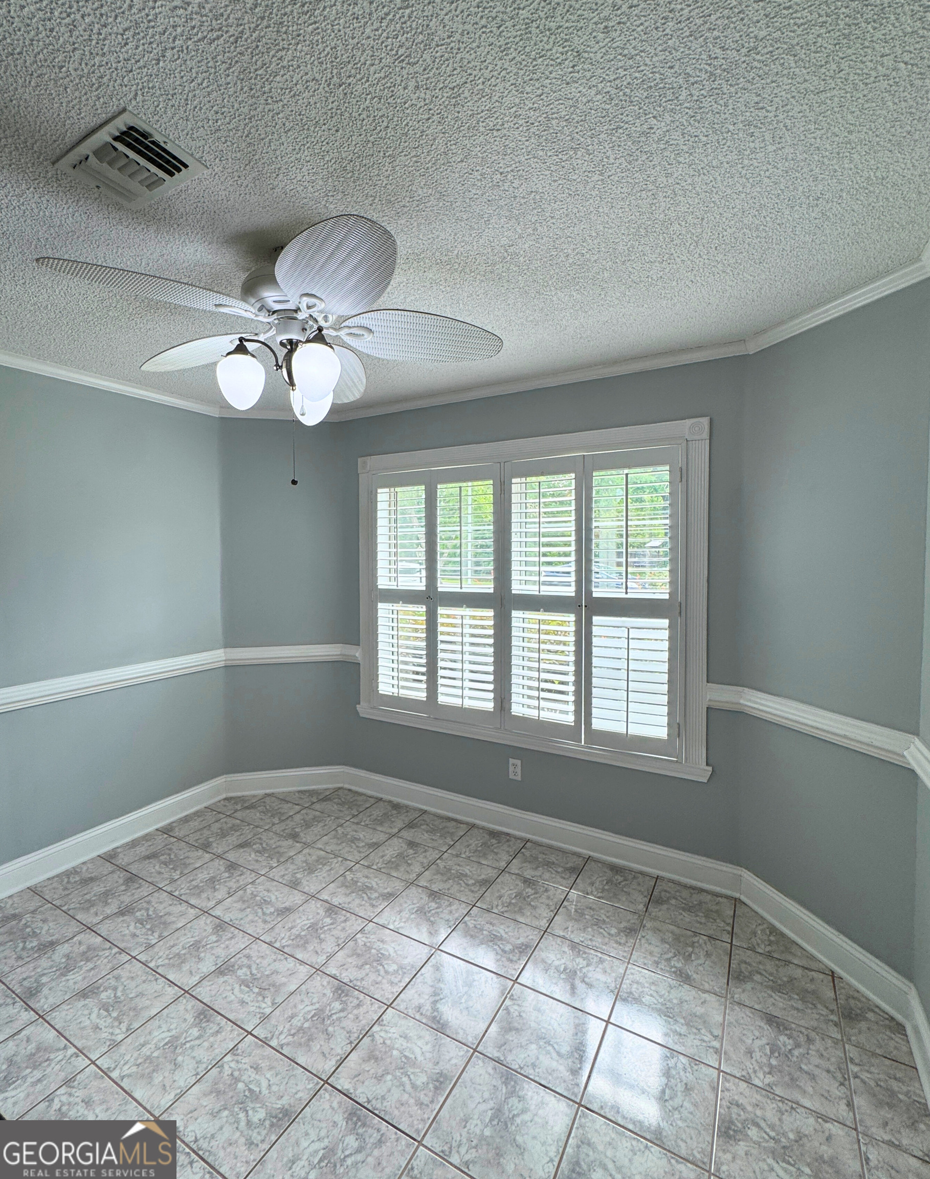176 Whippoorwill Circle Kingsland, GA 31548 - Photo 7 of 18 a view of an empty room with a window
