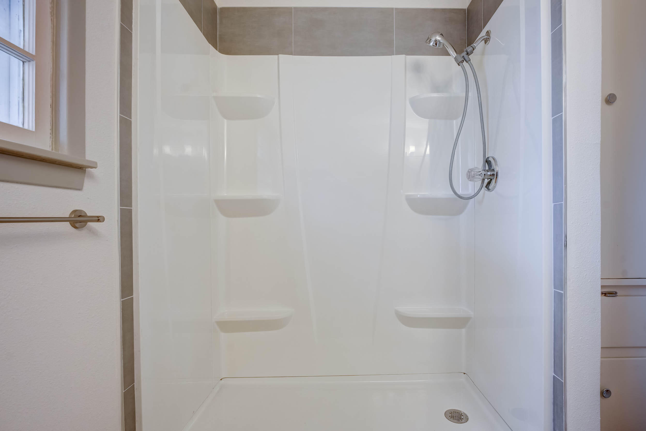 2101 64th Street Lubbock, TX 79412 - Photo 24 of 30 a bathroom with a shower