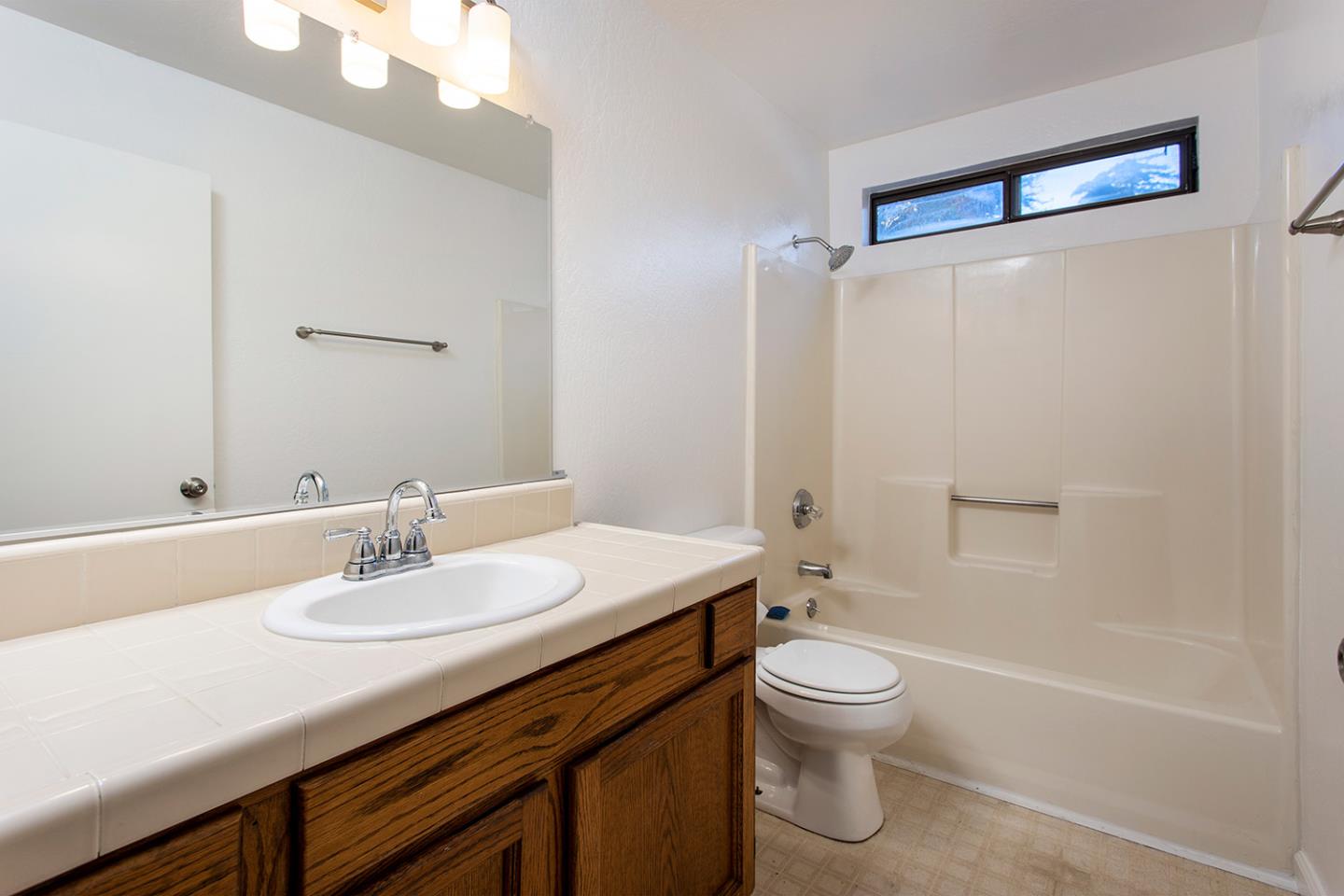 359 Moosehead Drive Aptos, CA 95003 - Photo 26 of 34 a bathroom with a sink a toilet and shower