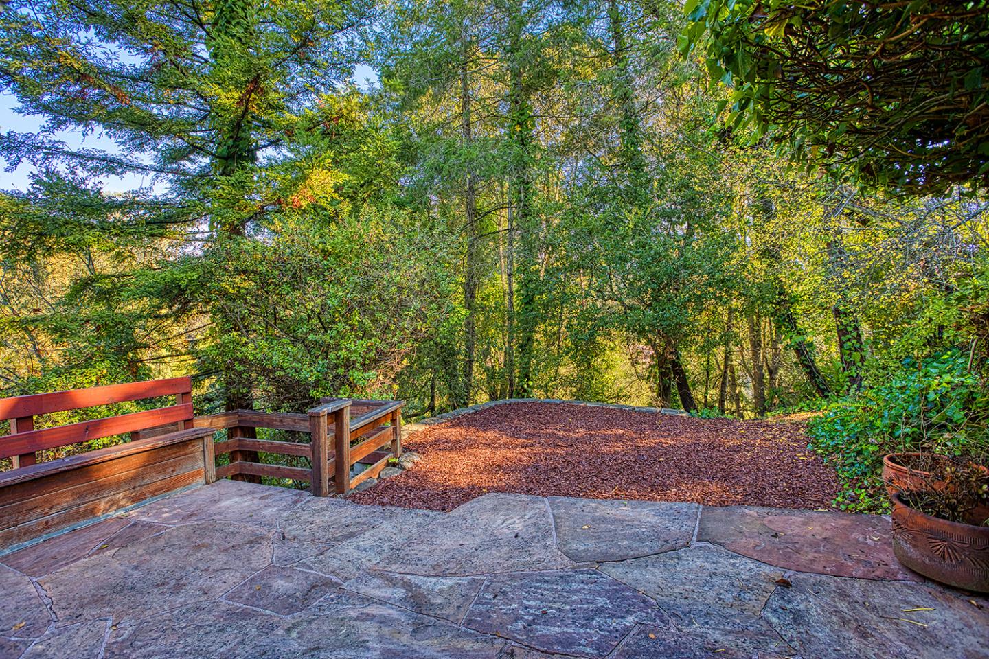 359 Moosehead Drive Aptos, CA 95003 - Photo 30 of 34 a backyard of a house with outdoor seating