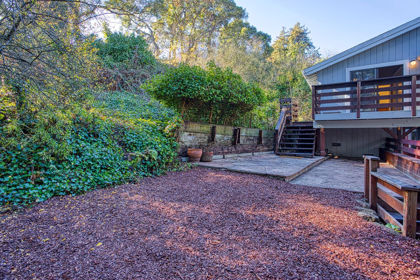 359 Moosehead Drive Aptos, CA 95003 - Photo 31 of 34 a backyard of a house with outdoor seating