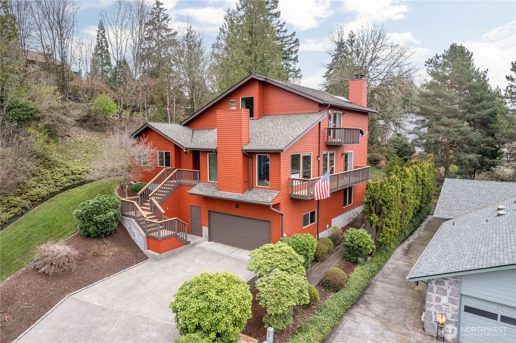 an aerial view of a house with porch