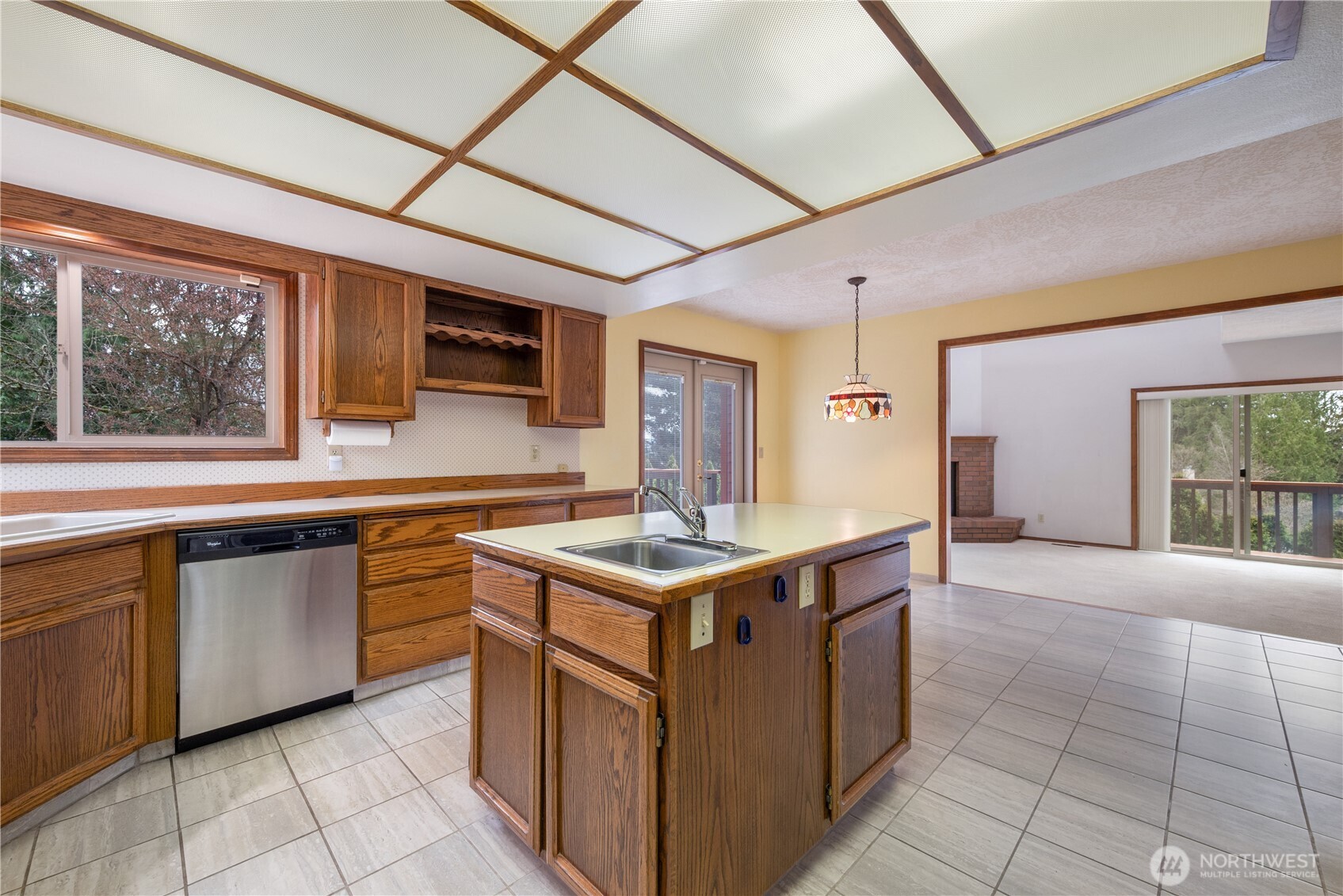 12 City View Boulevard Longview, WA 98632 - Photo 15 of 40 a kitchen with stainless steel appliances granite countertop a stove a sink and a microwave