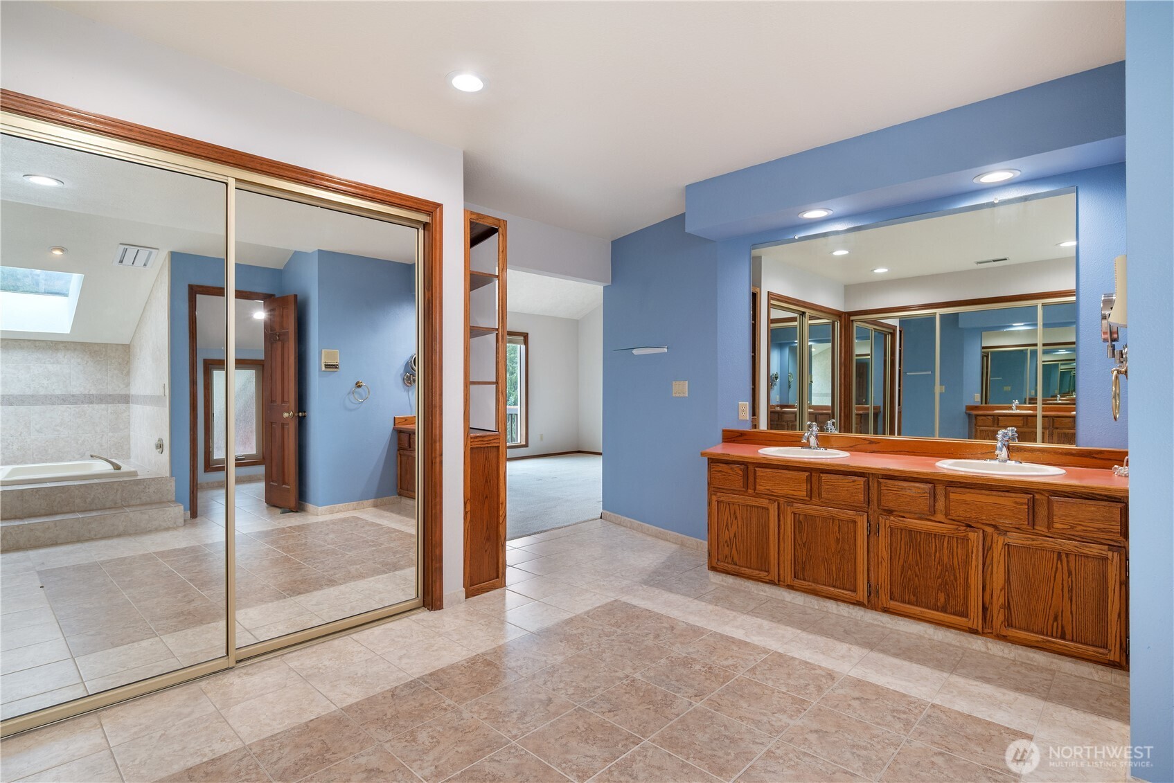 12 City View Boulevard Longview, WA 98632 - Photo 21 of 40 a large bathroom with a glass door shower and sink