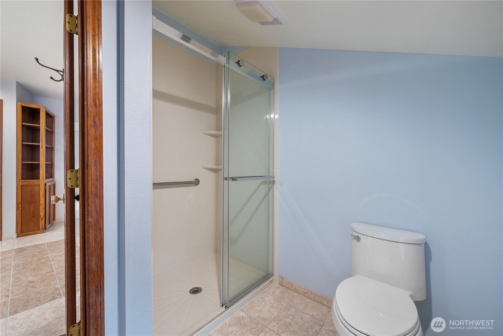 12 City View Boulevard Longview, WA 98632 - Photo 22 of 40 a white toilet sitting next to a bathroom sink