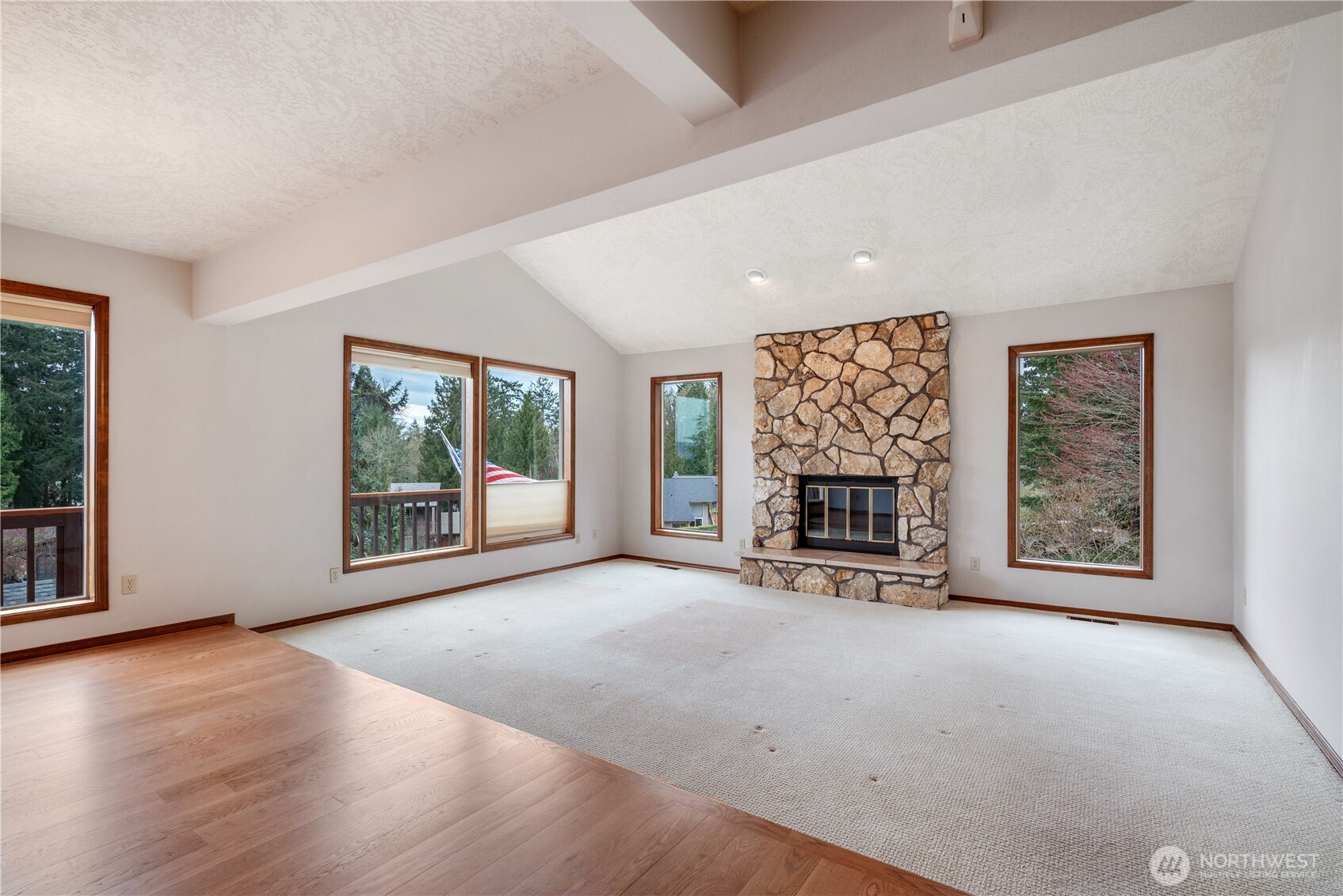 12 City View Boulevard Longview, WA 98632 - Photo 4 of 40 an empty room with furniture and a fireplace