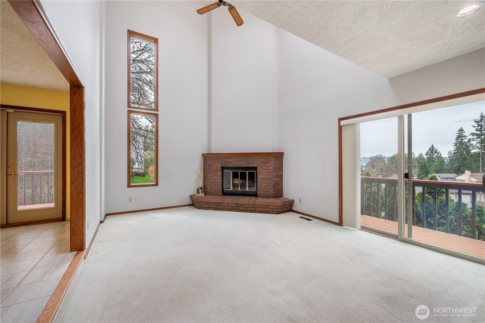 12 City View Boulevard Longview, WA 98632 - Photo 8 of 40 a view of an empty room with a fireplace and a window