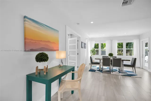 a kitchen with stainless steel appliances granite countertop a refrigerator sink and cabinets