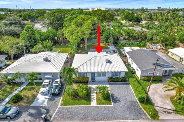 an aerial view of multiple house