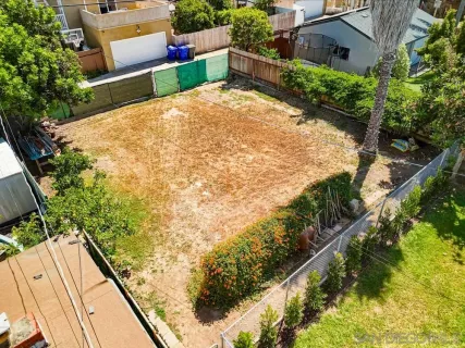 a view of swimming pool with a yard