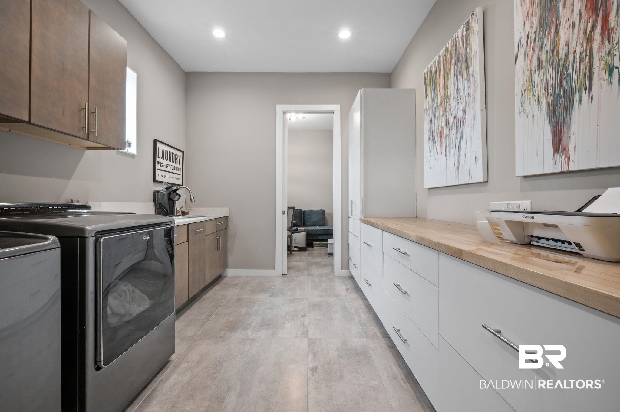 3840 Cotton Way Orange Beach, AL 36561 - Photo 33 of 75 Laundry room with cabinets, separate washer and dryer, and sink