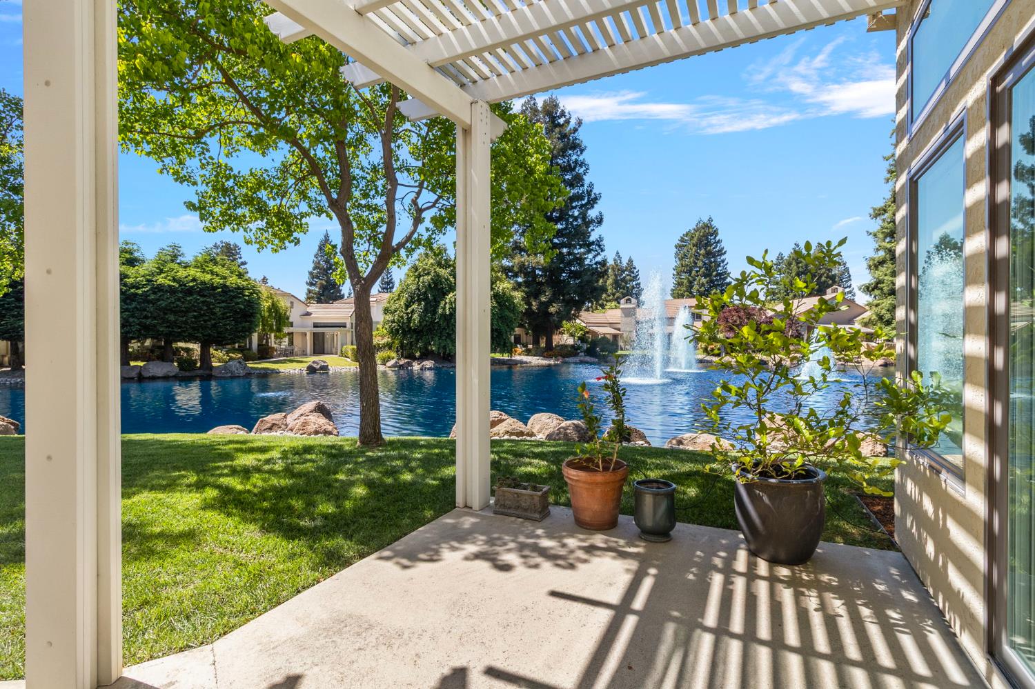 1013 Copper Lake Court Modesto, CA 95355 - Photo 37 of 66 a view of a backyard with sitting area
