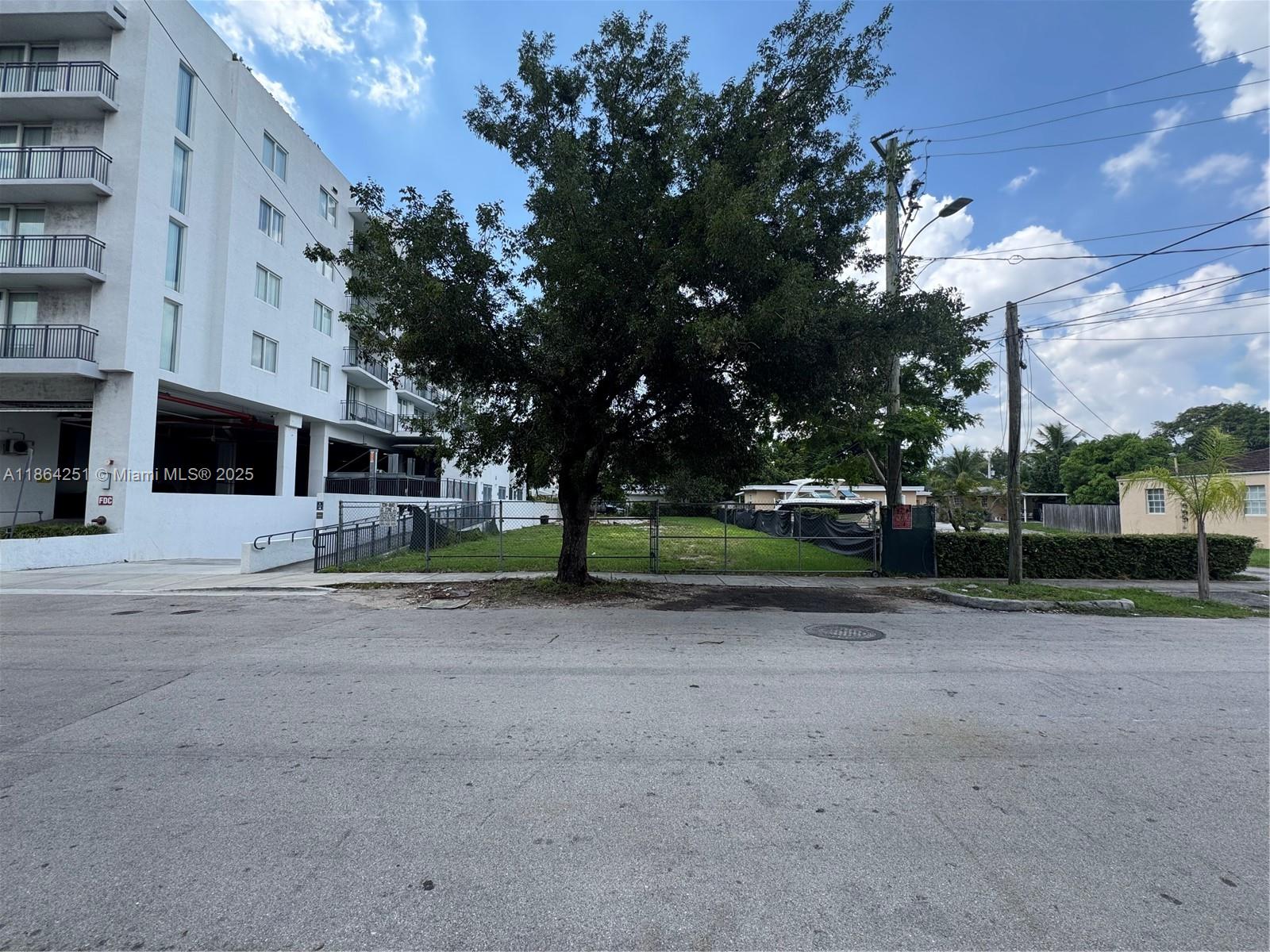 2720 Southwest 17th Street Miami, FL 33145 - Photo 2 of 4 a view of a house with a yard