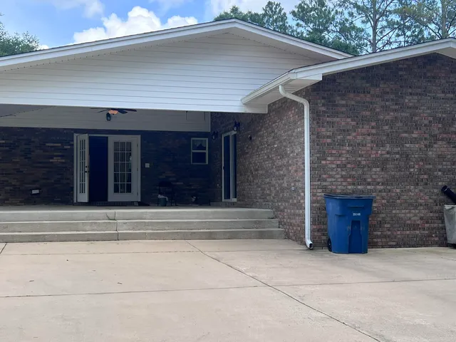 a view of a chairs in patio