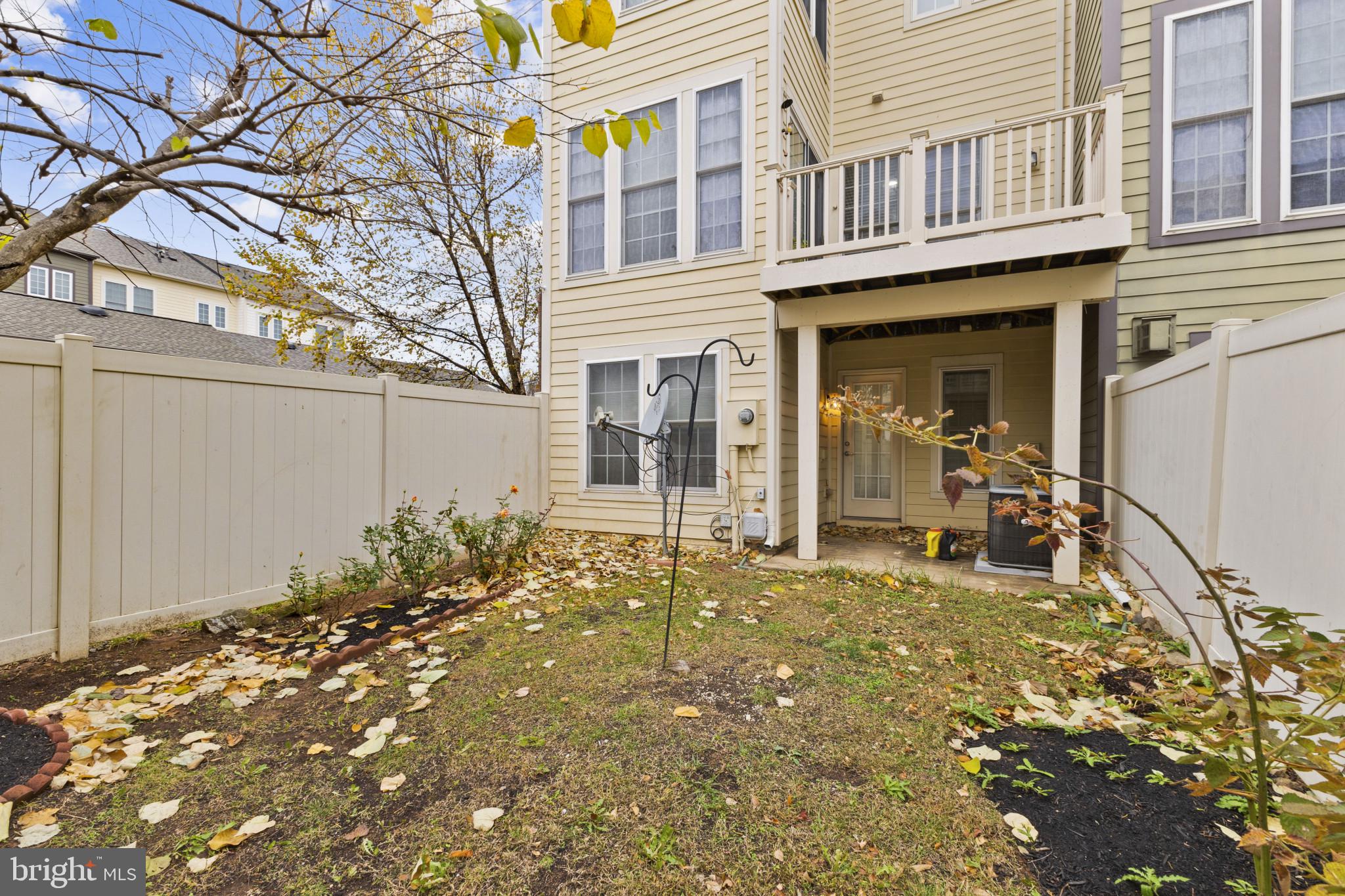 573 Dandelion Terrace Southeast Leesburg, VA 20175 - Photo 28 of 31 a house view with a outdoor space