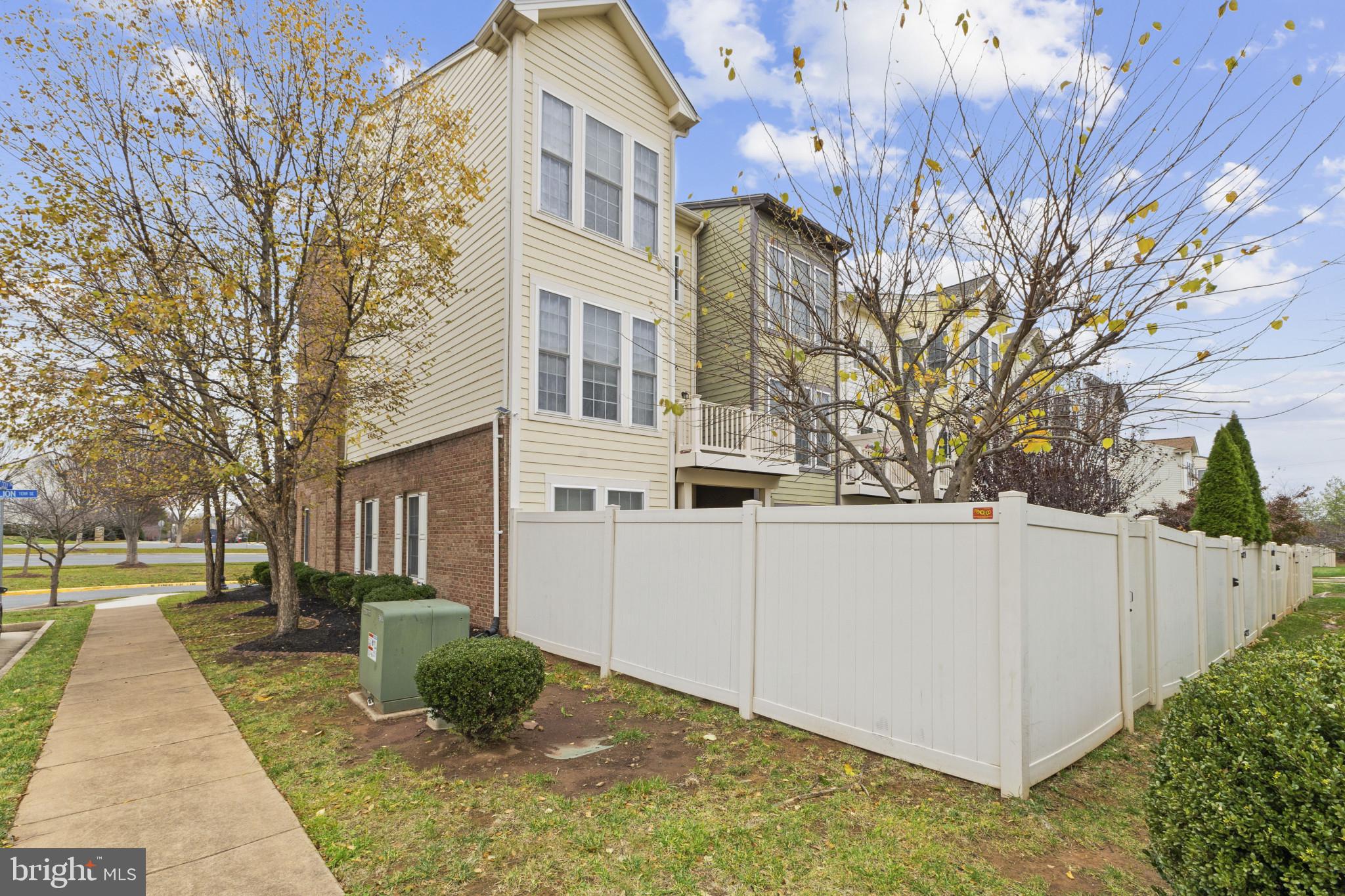 573 Dandelion Terrace Southeast Leesburg, VA 20175 - Photo 31 of 31 a view of a front of house with a yard
