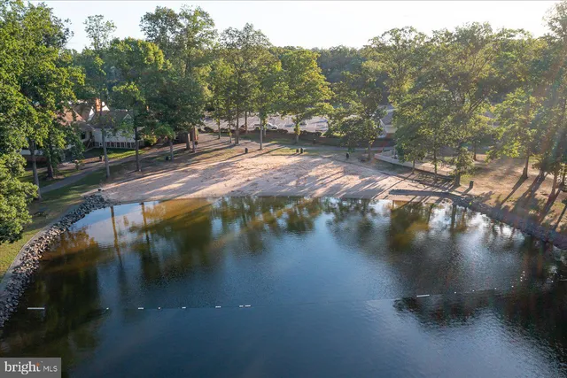 a view of a lake with sitting area