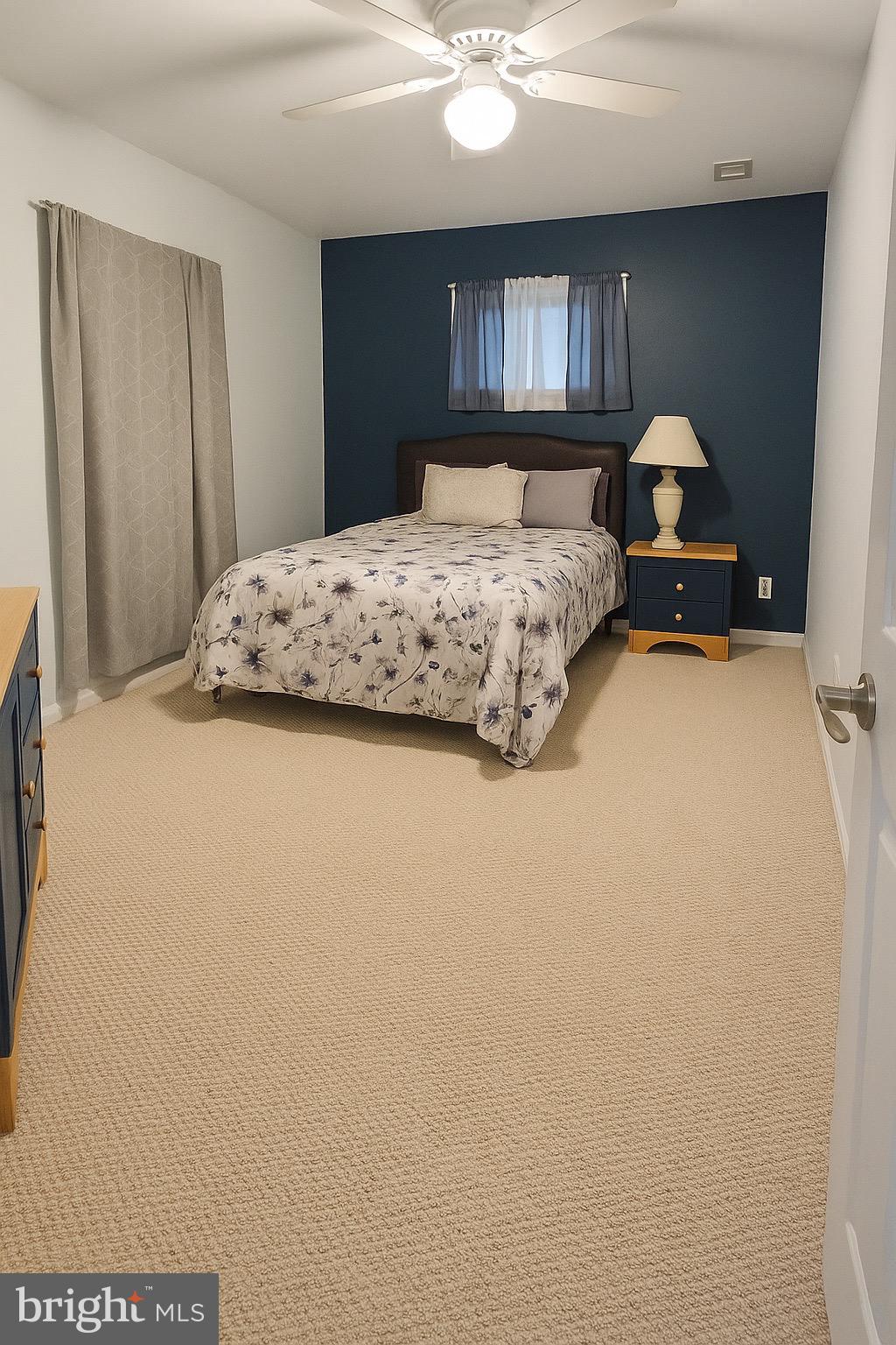 305 Wakefield Drive Locust Grove, VA 22508 - Photo 8 of 54 a bedroom with a bed and a chandelier