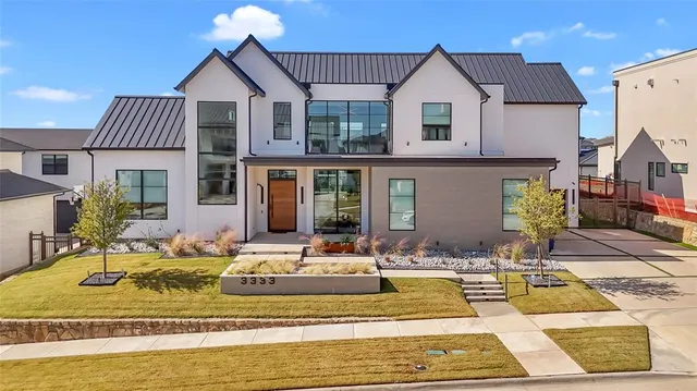 a front view of a house with swimming pool