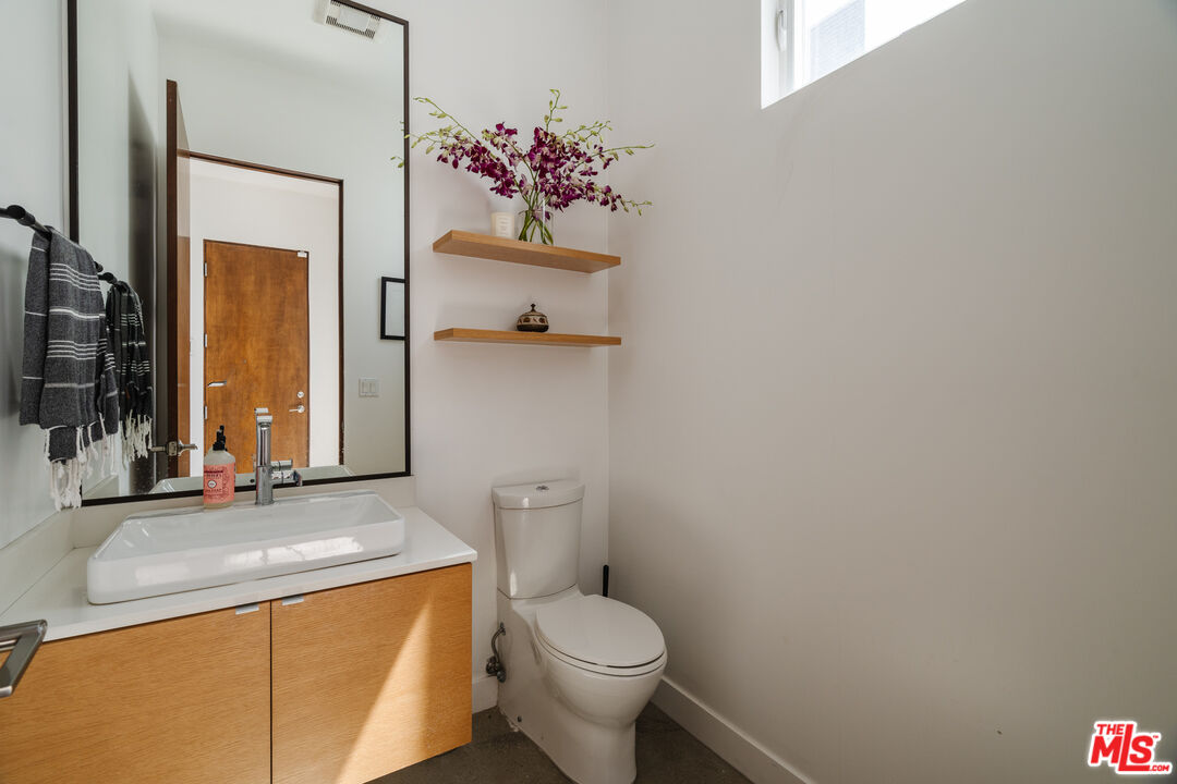 2437 Walnut Avenue Venice, CA 90291 - Photo 18 of 44 a bathroom with a sink and a toilet