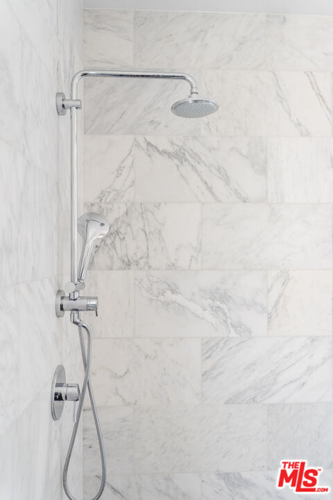 2437 Walnut Avenue Venice, CA 90291 - Photo 37 of 44 a bathroom with a shower