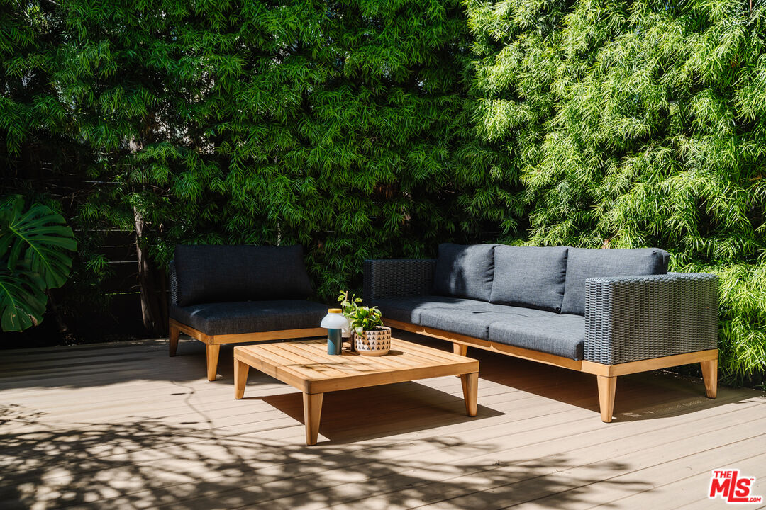 2437 Walnut Avenue Venice, CA 90291 - Photo 41 of 44 a outdoor living space with furniture and a potted plant