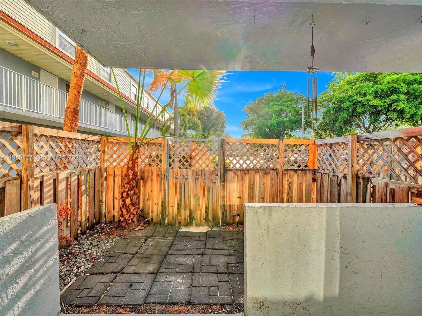 4600 Southwest 67th Avenue, Unit 155 Miami, FL 33155 - Photo 15 of 32 a view of a backyard